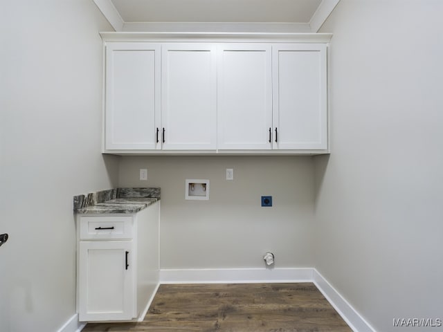 laundry room with cabinets, washer hookup, crown molding, and electric dryer hookup