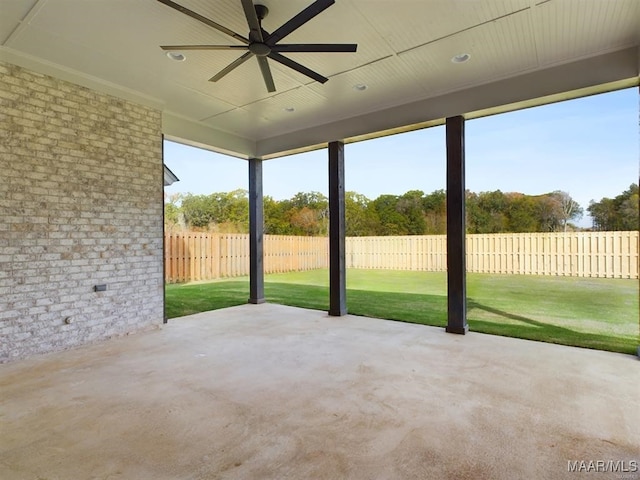 view of patio / terrace featuring fence and a ceiling fan