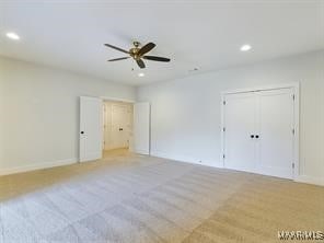 unfurnished bedroom featuring a ceiling fan, recessed lighting, and baseboards