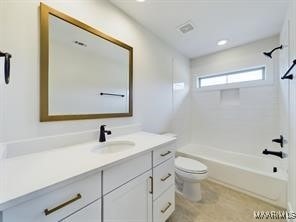 full bathroom with recessed lighting, bathtub / shower combination, vanity, and toilet