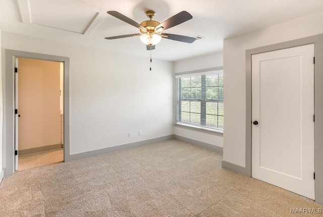 8319 Young Xing, Montgomery, AL 36116 - unfurnished bedroom with light colored carpet, attic access, connected bathroom, and ceiling fan