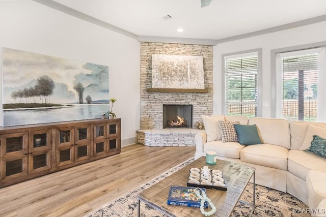 8319 Young Xing, Montgomery, AL 36116 - living room with wood finished floors, a fireplace, recessed lighting, and ornamental molding