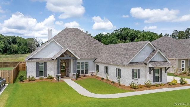 8319 Young Xing, Montgomery, AL 36116 - craftsman house with brick siding, a chimney, a shingled roof, and board and batten siding