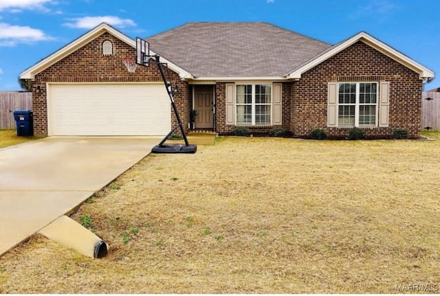 single story home featuring a garage and a front yard