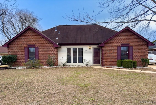 view of front of home with a front yard