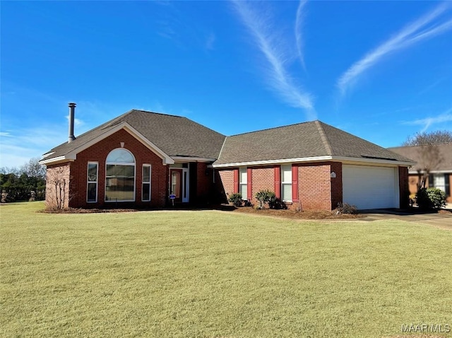 single story home featuring a front lawn and a garage