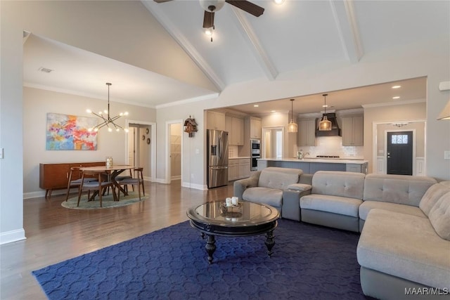 living room featuring ceiling fan with notable chandelier, beam ceiling, dark hardwood / wood-style flooring, high vaulted ceiling, and crown molding