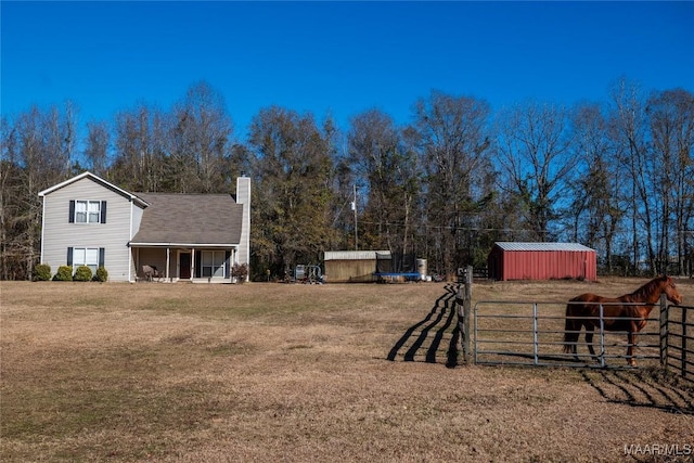 view of yard with a shed