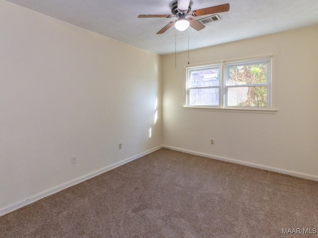 carpeted empty room with ceiling fan