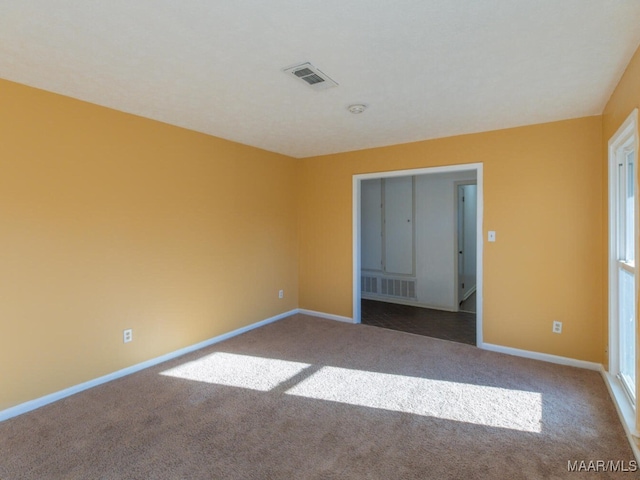 unfurnished bedroom featuring carpet flooring