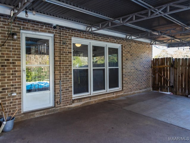 view of property exterior with a patio