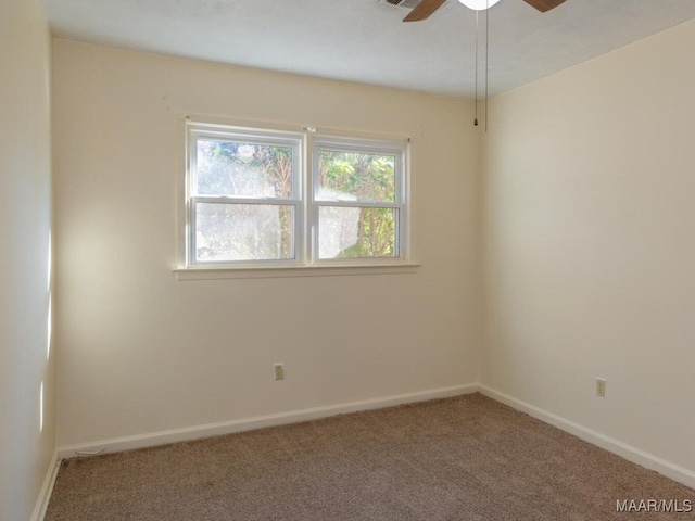 carpeted empty room with ceiling fan