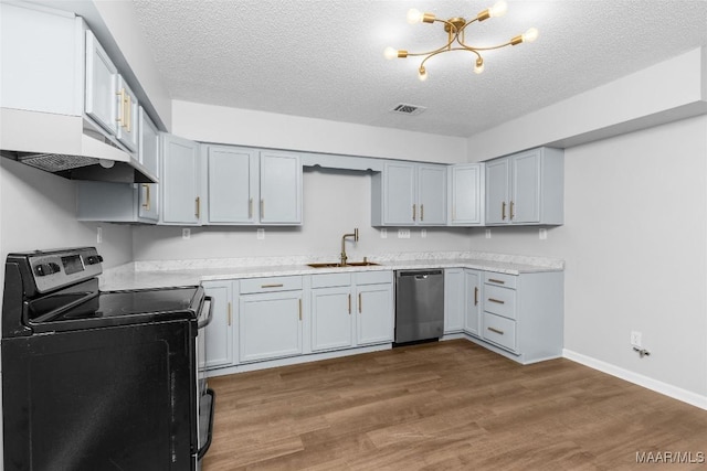 kitchen with a textured ceiling, dishwasher, black range with electric stovetop, and sink