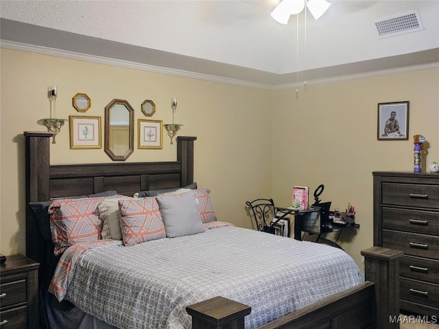 bedroom featuring ceiling fan and crown molding