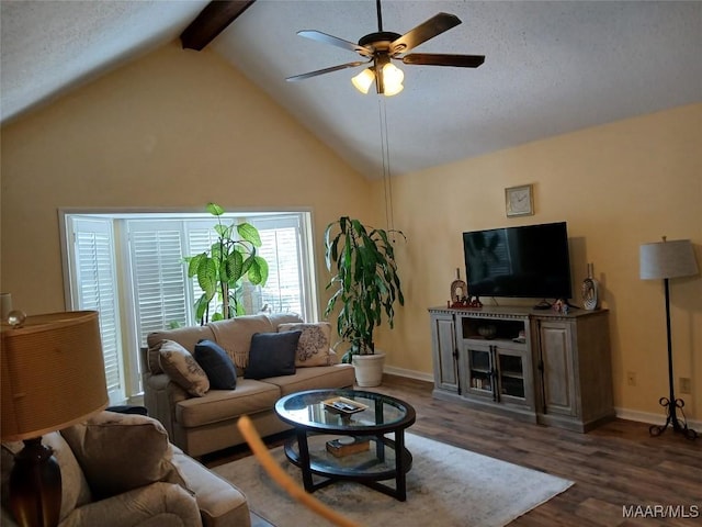 living room featuring ceiling fan, dark wood-type flooring, high vaulted ceiling, a textured ceiling, and beam ceiling