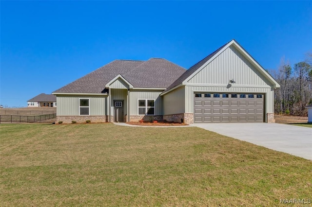 modern farmhouse style home featuring a garage and a front yard