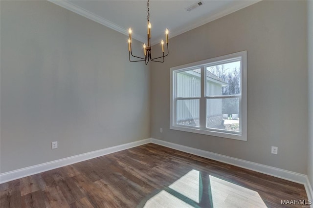 unfurnished room with crown molding, dark hardwood / wood-style flooring, and a notable chandelier