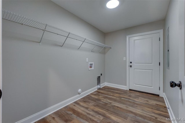 washroom with washer hookup and wood-type flooring