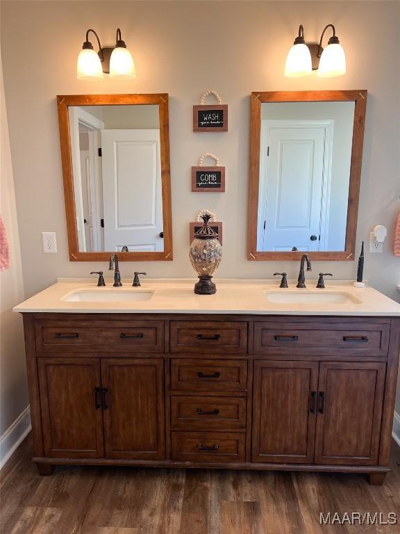 bathroom featuring vanity and wood-type flooring