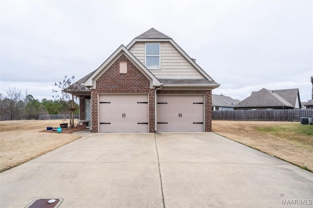 view of side of property with a garage