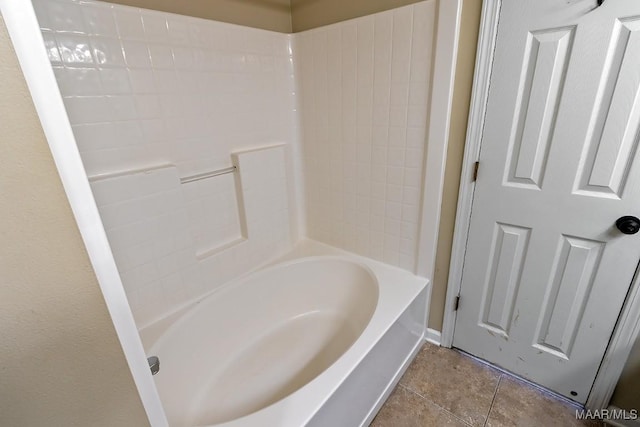 bathroom with tile patterned floors