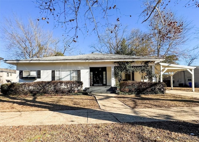 single story home with a carport