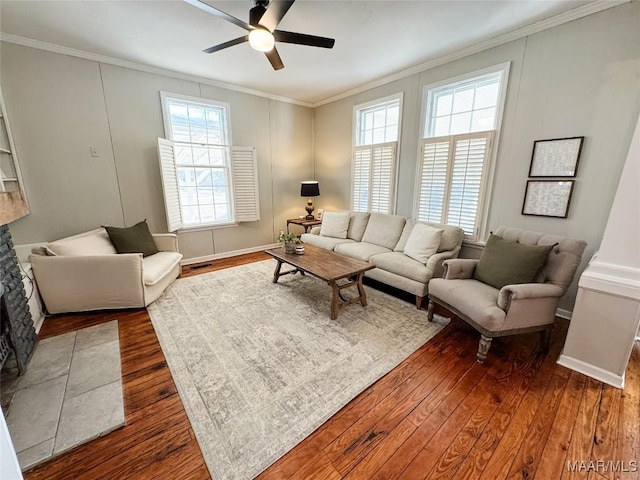 living room with ceiling fan, dark hardwood / wood-style flooring, and crown molding