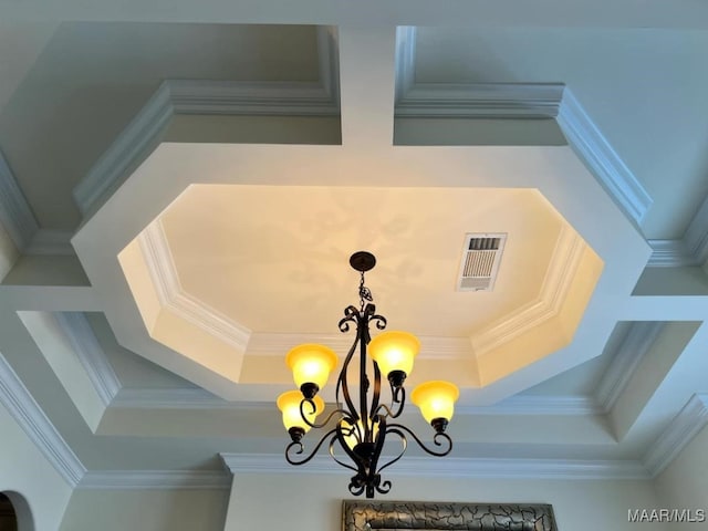 interior details featuring a chandelier and ornamental molding