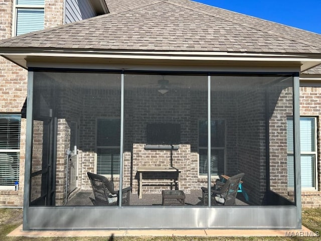 exterior space featuring a sunroom