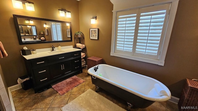 137 Scott Ln, Prattville, AL 36066 - bathroom featuring a soaking tub, vanity, and tile patterned floors