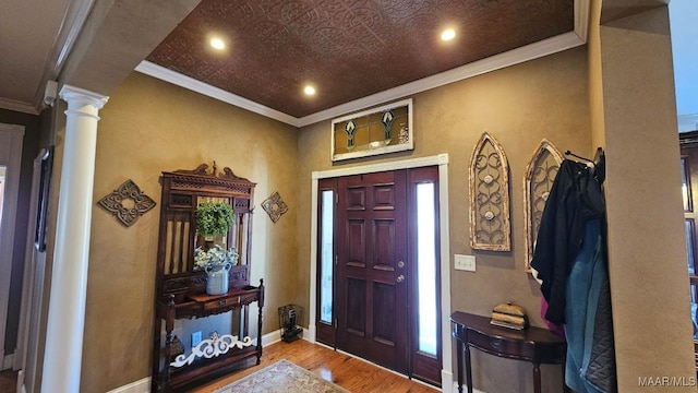 137 Scott Ln, Prattville, AL 36066 - foyer featuring wood finished floors, ornate columns, recessed lighting, and crown molding
