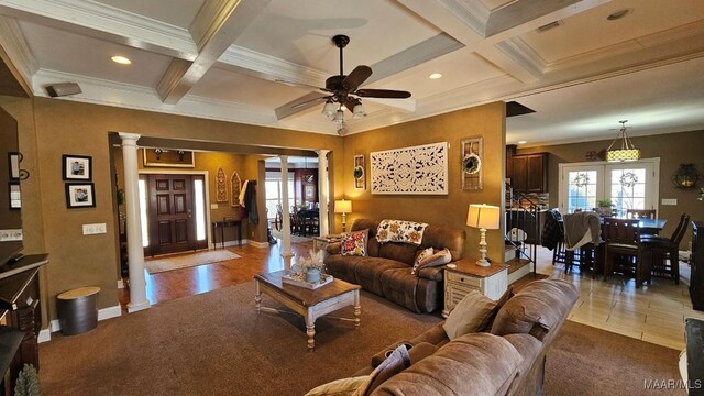 137 Scott Ln, Prattville, AL 36066 - living room featuring crown molding, decorative columns, coffered ceiling, a ceiling fan, and beam ceiling
