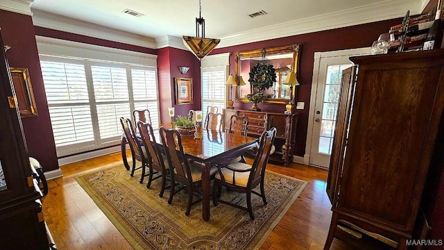 137 Scott Ln, Prattville, AL 36066 - dining area with wood finished floors and ornamental molding