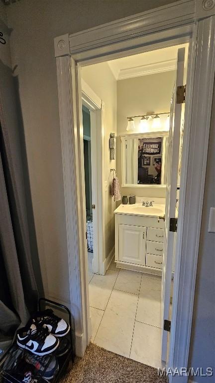 137 Scott Ln, Prattville, AL 36066 - bathroom featuring vanity, crown molding, and tile patterned flooring