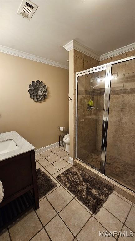 137 Scott Ln, Prattville, AL 36066 - bathroom with crown molding, a stall shower, tile patterned flooring, and vanity