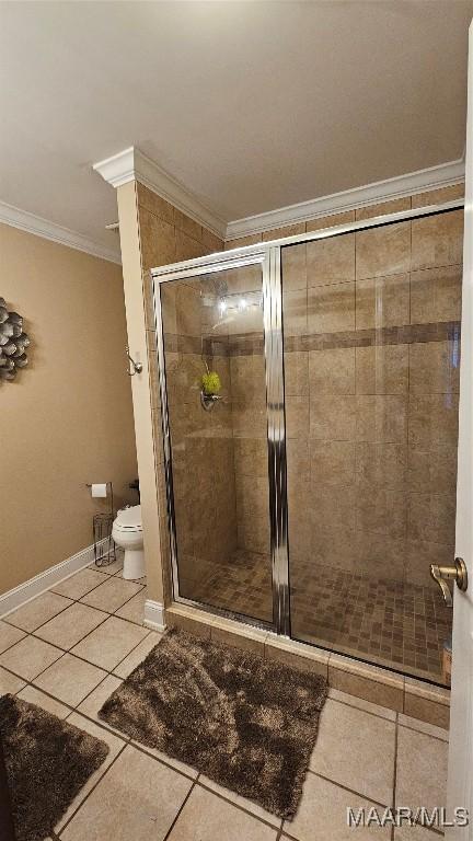137 Scott Ln, Prattville, AL 36066 - bathroom with ornamental molding, tile patterned flooring, and a shower stall