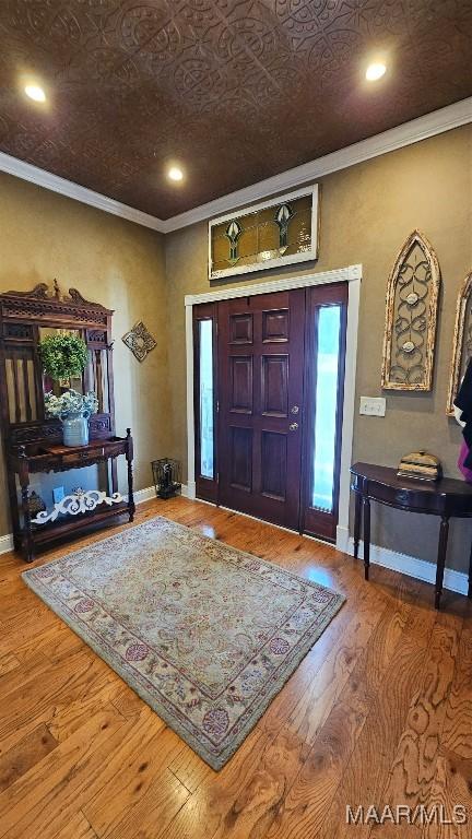 137 Scott Ln, Prattville, AL 36066 - entryway featuring crown molding, recessed lighting, wood finished floors, and an ornate ceiling
