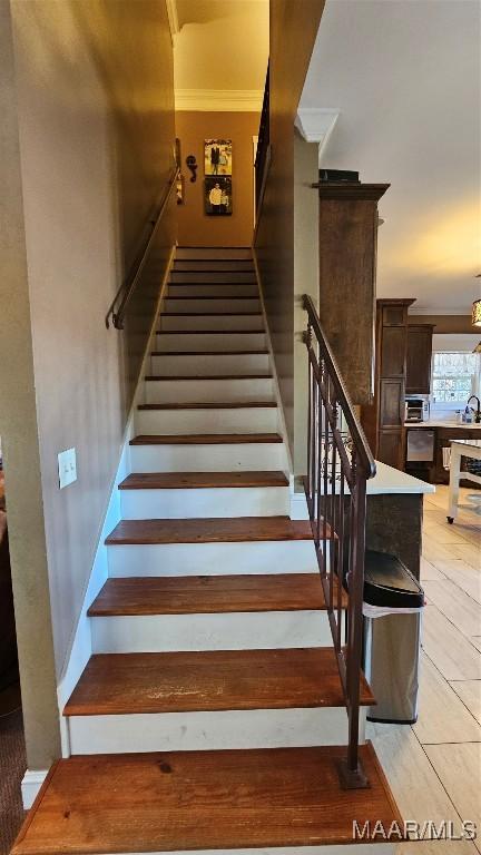 137 Scott Ln, Prattville, AL 36066 - stairs with crown molding and tile patterned flooring