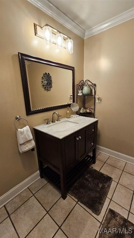 137 Scott Ln, Prattville, AL 36066 - bathroom featuring vanity, crown molding, and tile patterned floors