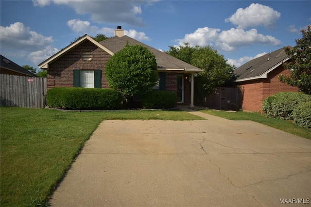 view of front of home with a front yard