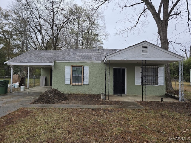 view of front of house with a carport