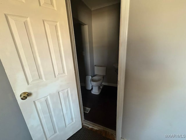 bathroom featuring toilet