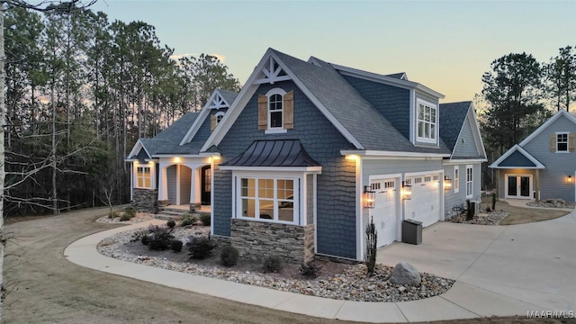 craftsman-style home with a garage