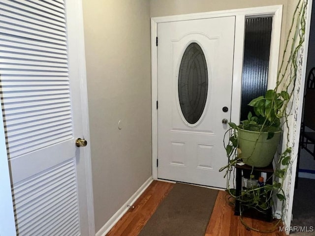 doorway to outside featuring dark hardwood / wood-style floors