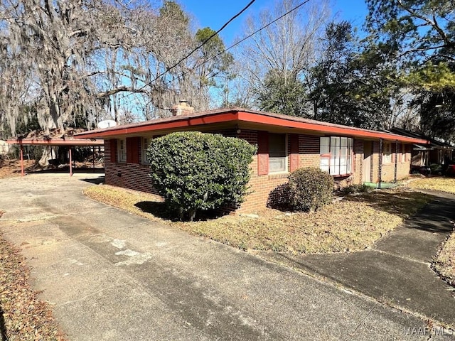 view of front of house featuring a carport