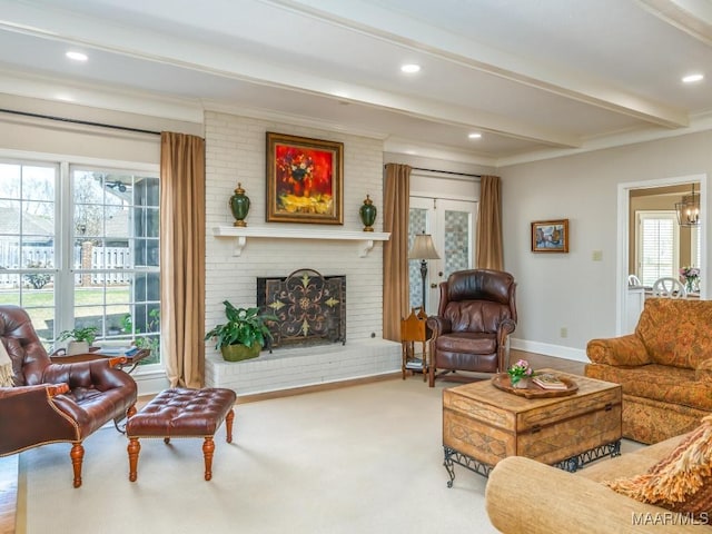 living room with crown molding, carpet, beam ceiling, and a fireplace