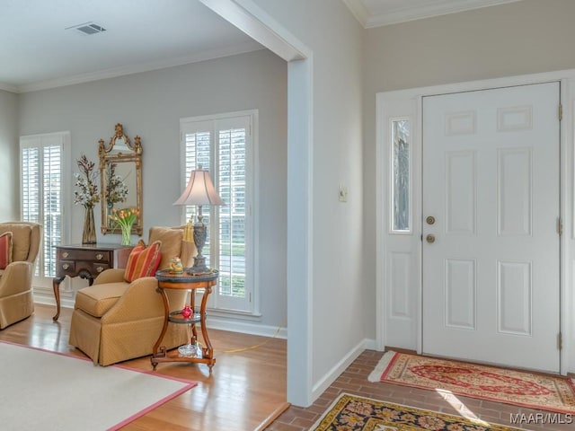 entryway with crown molding