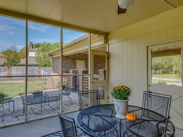 sunroom with a healthy amount of sunlight