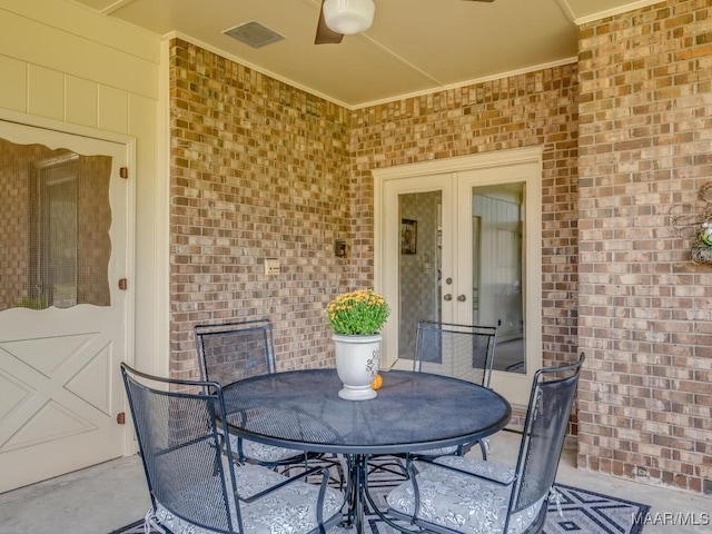 view of patio / terrace featuring ceiling fan