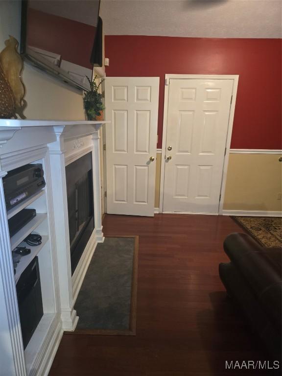 3601 Richardson Rd S, Hope Hull, AL 36043 - living room featuring dark wood-style floors and a fireplace